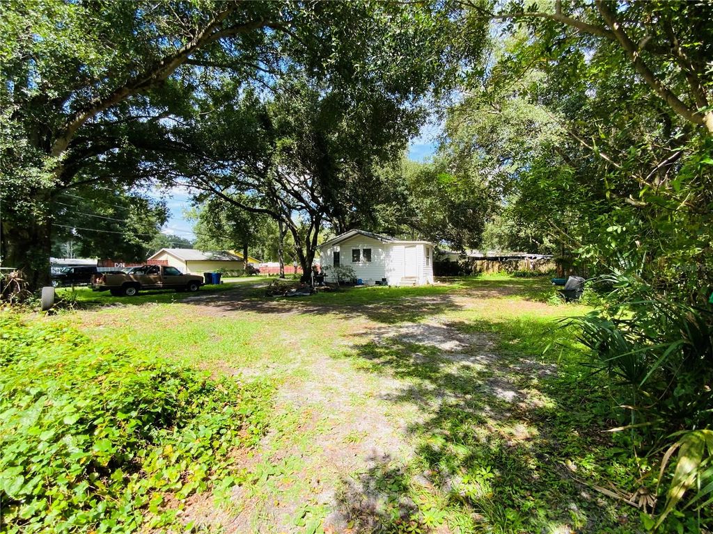 Photo of 5907 8th Avenue S, Tampa, FL 33619 (MLS # TB8451377)