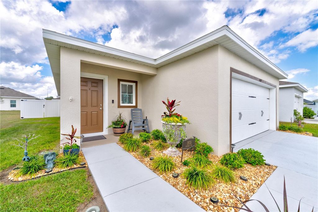 Photo of 1609 Finnigan Circle, Haines City, FL 33844 (MLS # O6396022)