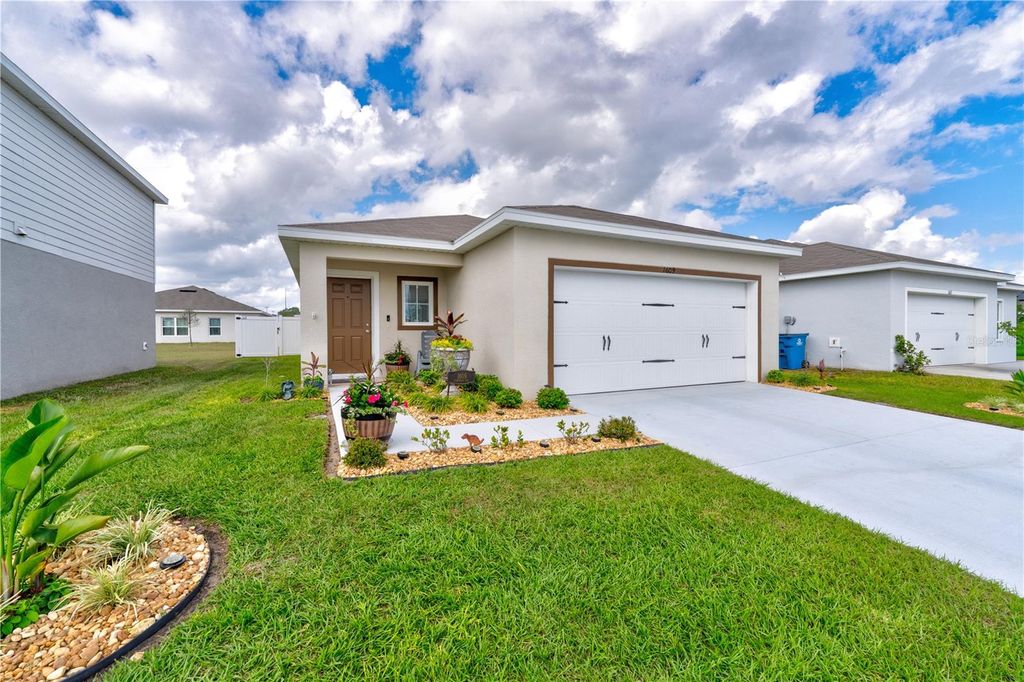 Photo of 1609 Finnigan Circle, Haines City, FL 33844 (MLS # O6396022)