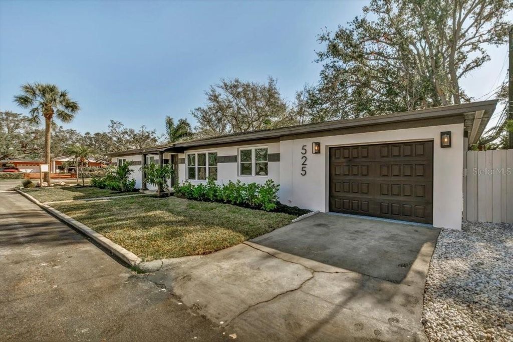 Photo of 525 Lamara Way NE, St Petersburg, FL 33704 (MLS # TB8462441)