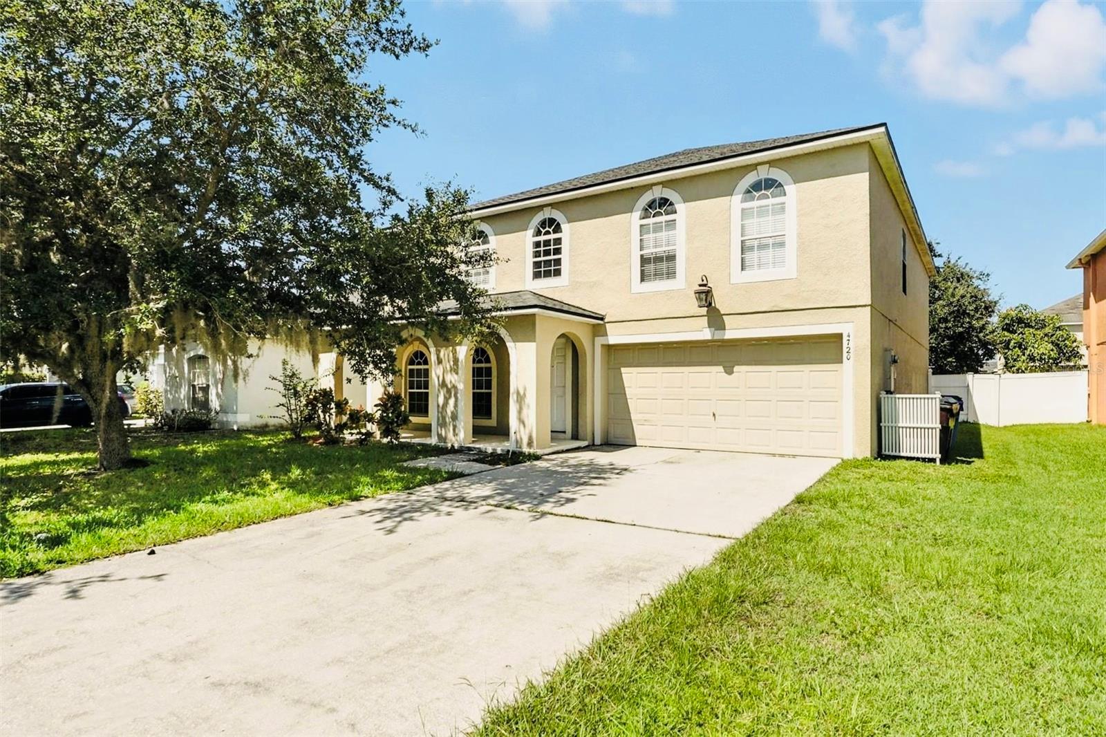 TWO EN SUITE BEDROOMS, 2021 ROOF, 2024 & 2021 A/C UNITS AND 2022 WATER HEATER. Welcome to this stunning 4 bedroom, 3.5 bathroom home with a spacious loft and nearly 3,000 square feet of living space, located in the highly sought after Southern Pines community of Saint Cloud, FL. A large covered front porch welcomes you, offering the perfect spot to relax. Upon entry, you’ll find a well designed living and dining room combination, with two separate hallways leading to the kitchen and the large family room. The gourmet kitchen is appointed with granite countertops, wood cabinets, stainless steel appliances, a functional island, and a massive walk in pantry with abundant shelving, ideal for storage and organization. Upstairs, the elegant banister leads to a generously sized loft, perfect for a media room, game room, or an additional living space. All bedrooms are located on the second floor and feature newer carpet flooring for comfort and style. This home boasts two en suite bedrooms, each offering his and her walk in closets. The primary suite is especially impressive with higher ceilings, is spacious enough to include a sitting area, and the en suite bathroom has dual vanities, a walk in shower, and a luxurious garden tub. Stylish laminate flooring flows throughout the main living areas, with tile in the kitchen and bathrooms. The fully fenced backyard offers privacy and charm, enhanced by a mature live oak tree that provides shade and beauty. Additional features include ceiling fans in every room, an inside laundry room, window blinds throughout, an attached two car garage and many more. Conveniently located just minutes from Royal St. Cloud Golf Links, shopping, dining, Walmart, Publix, and major roadways including the Florida Turnpike.