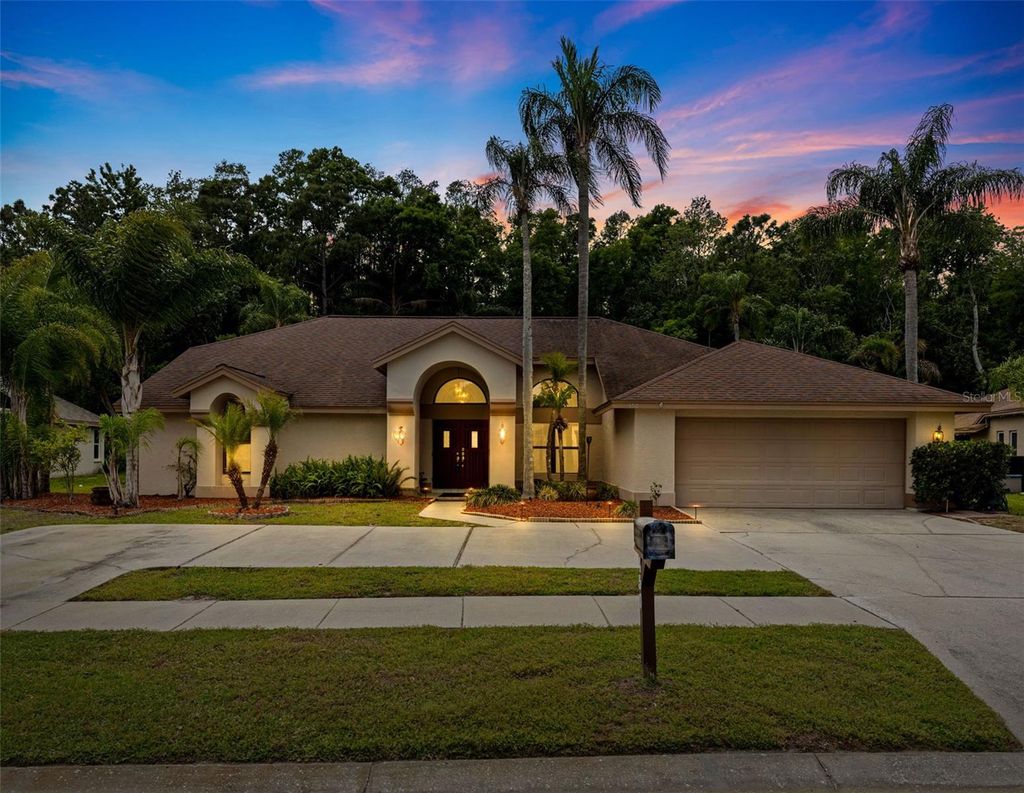 Photo of 450 Waterford Circle E, Tarpon Springs, FL 34688 (MLS # TB8452903)