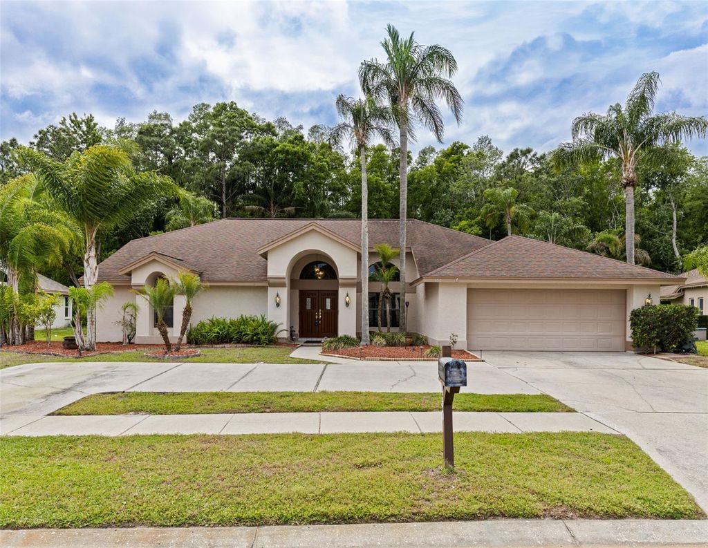 Photo of 450 Waterford Circle E, Tarpon Springs, FL 34688 (MLS # TB8452903)