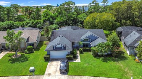 Photo of 3247 Timucua Circle, Orlando, FL 32837 (MLS # O6343321)