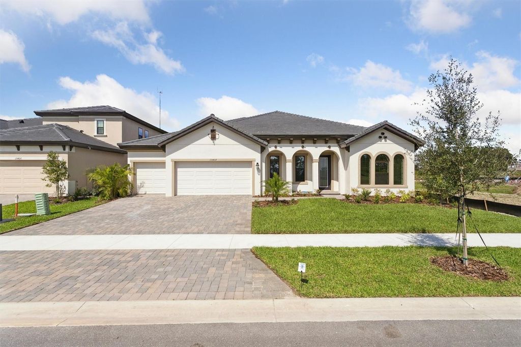 Photo of 13432 Buffalo Mountain Avenue, Riverview, FL 33579 (MLS # TB8434370)