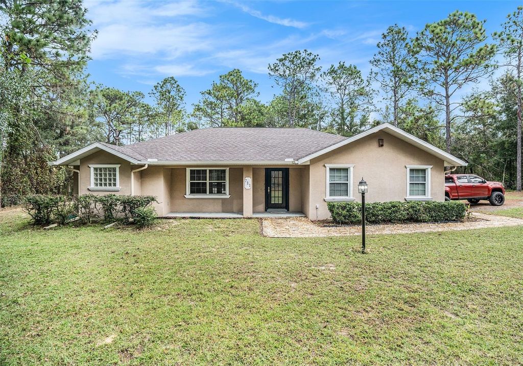 Photo of 711 W Wheeling Lane, Hernando, FL 34442 (MLS # TB8411277)