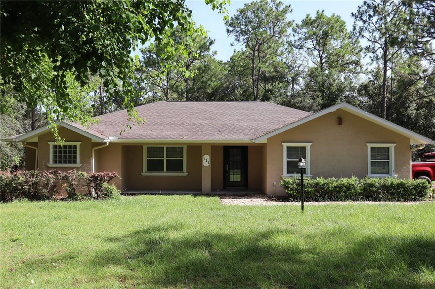 Discover your own private retreat on over 2 acres at 711 W Wheeling Lane in beautiful Hernando, Florida!
This beautifully maintained home offers peace, privacy, and plenty of room to spread out—inside and out. Freshly updated with new carpet and interior paint, the interior feels crisp, clean, and move-in ready.

Step outside to your screened-in pool and spacious patio, ideal for year-round relaxation and entertaining. The pool features a high-efficiency variable-speed pump, and the AC system was replaced just two years ago, providing both comfort and energy savings.

Located just minutes from Homosassa Springs and its world-famous wildlife park, this home combines the best of nature and convenience. Surrounded by mature trees and natural beauty, the property offers a tranquil escape while still being close to shops, restaurants, and the Gulf Coast’s top outdoor activities.

Whether you're searching for your forever home, a weekend getaway, or an investment opportunity, this unique property checks all the boxes.