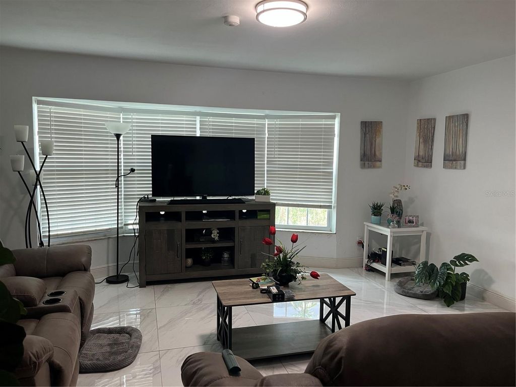Photo of 1009 S 70th Street, Tampa, FL 33619 (MLS # TB8434191)