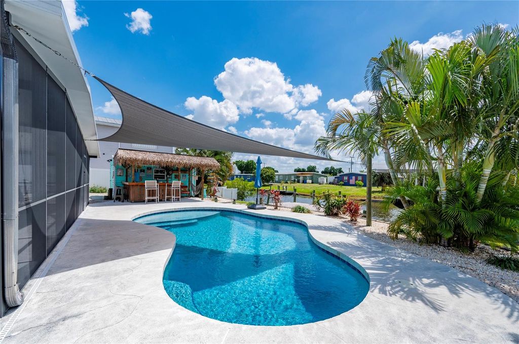 Photo of 671 Sharon Circle, Port Charlotte, FL 33952 (MLS # C7524310)