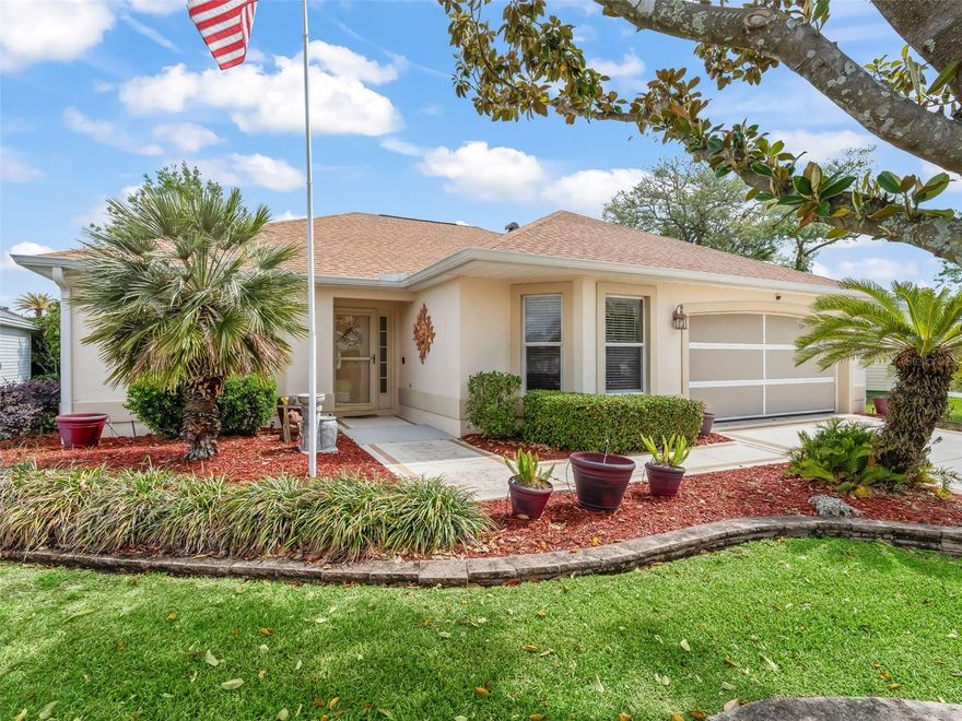 TURNKEY AND WELCOMING, THIS BEAUTIFULLY MAINTAINED 3-BEDROOM, 2-BATH CONCRETE BLOCK AND STUCCO “JASMINE” DESIGNER SINGLE-FAMILY HOME WITH 1658 SF OF LIVING SPACE IS NESTLED ON A QUIET CUL-DE-SAC IN THE VILLAGE OF WOODBURY IN THE VILLAGES® FLORIDA.  DESIGNED FOR BOTH COMFORT AND FUNCTIONALITY, THIS HOME FEATURES A DESIRABLE SPLIT FLOOR PLAN THAT OFFERS PRIVACY FOR BOTH OWNERS AND GUESTS.  
STEP INSIDE TO DISCOVER LIVING AREAS HIGHLIGHTED BY VOLUME CEILINGS THAT CREATE AN OPEN, AIRY FEEL THROUGHOUT.
THE KITCHEN IS WELL-APPOINTED WITH STAINLESS STEEL APPLIANCES, A COZY EAT-IN SPACE, AND A CABINET PANTRY EQUIPPED WITH CONVENIENT ROLLOUT SHELVING-PERFECT FOR ORGANIZATION AND ACCESS.  THIS HOME OFFERS LAMINATE FLOORING LAID DIAGONALLY THROUGHOUT THE MAIN LIVING AREAS AND BEDROOMS, WITH DURABLE VINYL FLOORING IN THE KITCHEN, BATHROOMS, AND INDOOR LAUNDRY ROOM.  THE PRIMARY BEDROOM HAS A SPACIOUS WALK IN CLOSET AND EN SUITE WITH DUAL SINK VANITY, SHOWER AND LINEN CLOSET.  THE GUEST BATHROOM HAS SHOWER WITH TUB.  THE INDOOR LAUNDRY ADDS EVERYDAY CONVENIENCE AND IS LOCATED OFF FROM THE PRIMARY BEDROOM AND WITH ACCESS DOOR FROM THE GARAGE.  THE ATTACHED TWO-CAR GARAGE PROVIDES AMPLE STORAGE AND PARKING.  RELAX AND UNWIND IN THE ENCLOSED FLORIDA ROOM OR ENJOY THE OUTDOORS YEAR-ROUND IN THE SCREENED BIRDCAGE-IDEAL FOR SOAKING IN THE FLORIDA SUNSHINE.
THIS HOME COMBINES PRACTICAL FEATURES WITH COMFORTABLE LIVING, ALL IN A PEACEFUL CUL-DE-SAC LOCATION CLOSE TO THE MANY AMENITIES IN THE VILLAGES® SUCH AS THE LOPEZ LEGACY COUNTRY CLUB, MULBERRY REGIONAL RECREATION CENTER WHICH ALSO HAS INDOOR FITNESS CENTER, MULBERRY GROVE SHOPPING AREA WITH RESTAURANTS, BANKING, SHOPPING, AND SO MUCH MORE.
JUST A SHORT GOLF CART RIDE TO THE SPRINGDALE COMMUNITY SWIMMING POOL AND DOG PARK, SAVANNAH CENTER AND GLENVIEW COUNTRY CLUB.  ROOF 2025. VERY LOW BOND BALANCE, JUST $1551.42.  IN ADDITION TO BEING SOLD TURNKEY, THE YAMAHA® GASOLINE GOLF CART IS INCLUDED.  WHEN YOU SEE THIS HOUSE YOU WILL WANT TO MAKE IT YOUR HOME.  DON'T DELAY, SEE IT TODAY.