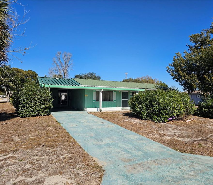 Welcome to this charming home located in the desirable 55+ active adult community of Pine Run! This 2 bedroom, 2 bathroom home is being sold fully furnished, making it a perfect option for a seasonal getaway, second home, or anyone ready to downsize and enjoy easy Florida living. Inside, you’ll find a comfortable layout with carpet in the living room, hallway, and bedrooms, creating a warm and cozy feel throughout. The home also features a durable metal roof for peace of mind and an oversized carport with plenty of covered parking and space for guests. Situated on a corner lot, this property offers extra outdoor space and a more open setting. Enjoy the benefits of an affordable HOA, plus a convenient location near restaurants, shopping, and medical facilities, and just a short drive to the Withlacoochee River. This move-in-ready home is ready for you to start enjoying the relaxed active adult lifestyle Pine Run is known for!