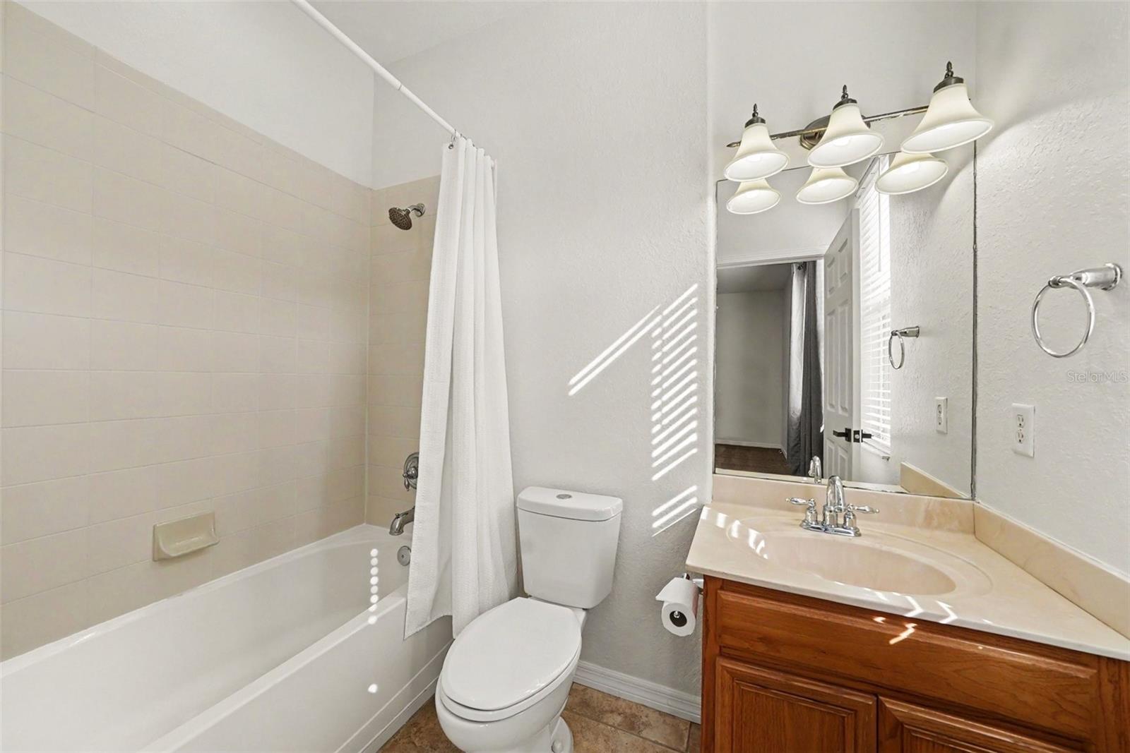 Virtually Staged. Situated on a quiet cul-de-sac in the gated communit – image 25