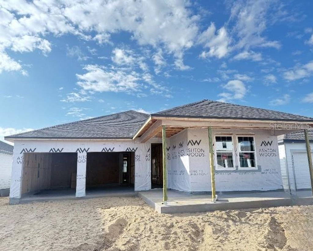 Photo of 30116 Misty Pines Rd, Mount Dora, FL 32757 (MLS # TB8465157)