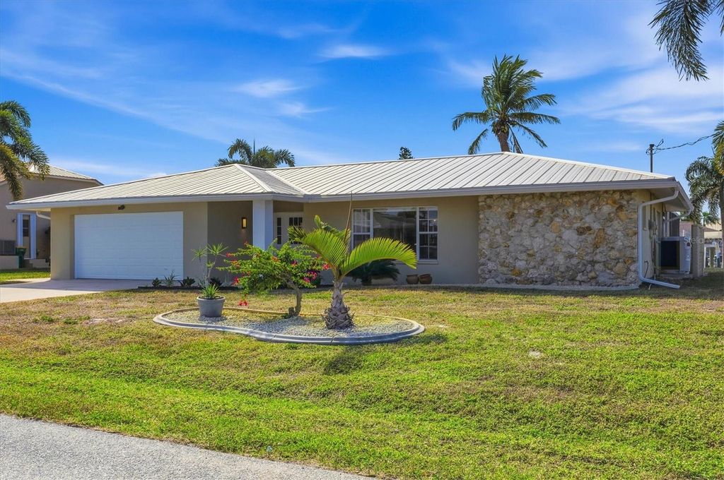 Photo of 133 Colonial Street SE, Port Charlotte, FL 33952 (MLS # N6142639)