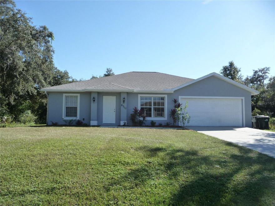 Beautifully updated 3 bedroom home in nice North Port neighborhood. This home has a newer roof, new a/c, newer water heater, all new appliances and has been freshly painted. A spacious kitchen contains wood cabinets, stunning quartz counters, all new appliances and 2 pantries. The great room is bright and airy with lots of space for that big tv and comfortable furniture. A conveniently located inside laundry room has a new washer and dryer and pocket door to avoid noise. This split floor plan includes a large Primary Suite with a walk-in closet and dressing table. Two spacious bedrooms are located on the opposite side of the home for the privacy we all enjoy. Adjoining the dining room, the enclosed lanai is perfect for a morning coffee or afternoon tea.  It is peaceful here, no neighbors on either side or in back of the home. Great shopping and entertainment are close however. A water park, Community Center, Warm Mineral Springs and sparkling gulf beaches are just minutes away.  Everything for the great Florida lifestyle is waiting for you here, and the seller is ready to help you make your dreams come true. See this lovely home with the very lovely price. Why buy new when you can get better for LOTS less?