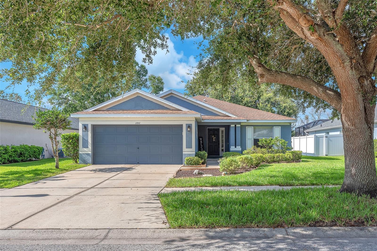 Under contract-accepting backup offers. BRAND NEW ROOF COMING SOON ~ SELLER WILL HELP WITH CLOSING COSTS ~ UPDATED KITCHEN ~ UPDATED BATHROOMS ~ UPDATED FLOORING ~ NO REAR NEIGHBORS ~ FENCED YARD ~ RESORT STYLE AMENITIES ~ Move-In Ready Home! Welcome to 11841 Autumn Creek Dr in the heart of Riverview! This charming 4-bedroom, 2-bath home offers the perfect blend of comfort, privacy, and peace of mind—with a brand-new roof to be installed before closing. Step inside to a bright and open floor plan, ideal for both everyday living and entertaining. The spacious kitchen opens to the living and dining areas, creating a seamless space for gathering with family and friends. The primary suite features a walk-in closet and private en-suite bath, while the three additional bedrooms offer flexibility for a home office, guest room, or growing family. Enjoy Florida living at its finest in the fully fenced backyard, perfect for pets, play, or simply relaxing outdoors. With no rear neighbors, you’ll appreciate the extra privacy and tranquility. Located in a quiet, established neighborhood with convenient access to shopping, dining, schools, and major highways—this home checks all the boxes. Don’t miss your opportunity to own this well-maintained gem with a brand-new roof and unbeatable privacy. Schedule your showing today!