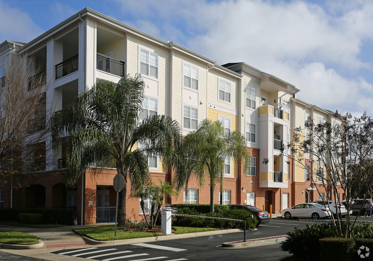 Want to be within walking distance to the Winter Springs Town Center? This is it! Beautiful first floor condo with 10' ceilings! Split 2 bedroom with luxury touches throughout. Crown molding in the living room, granite counters throughout, solid wood cabinets, stainless steel appliances and your own private patio entrance! This home feels so much more spacious than the square footage due to the high ceilings and open floor plan. There is an elevator in the building and a trash chute room. Rental rate includes washer and dryer, water, sewer, trash and gas. Walk down to Publix, hair and nail salons, the new Aldi and many of the great restaurants to choose from.