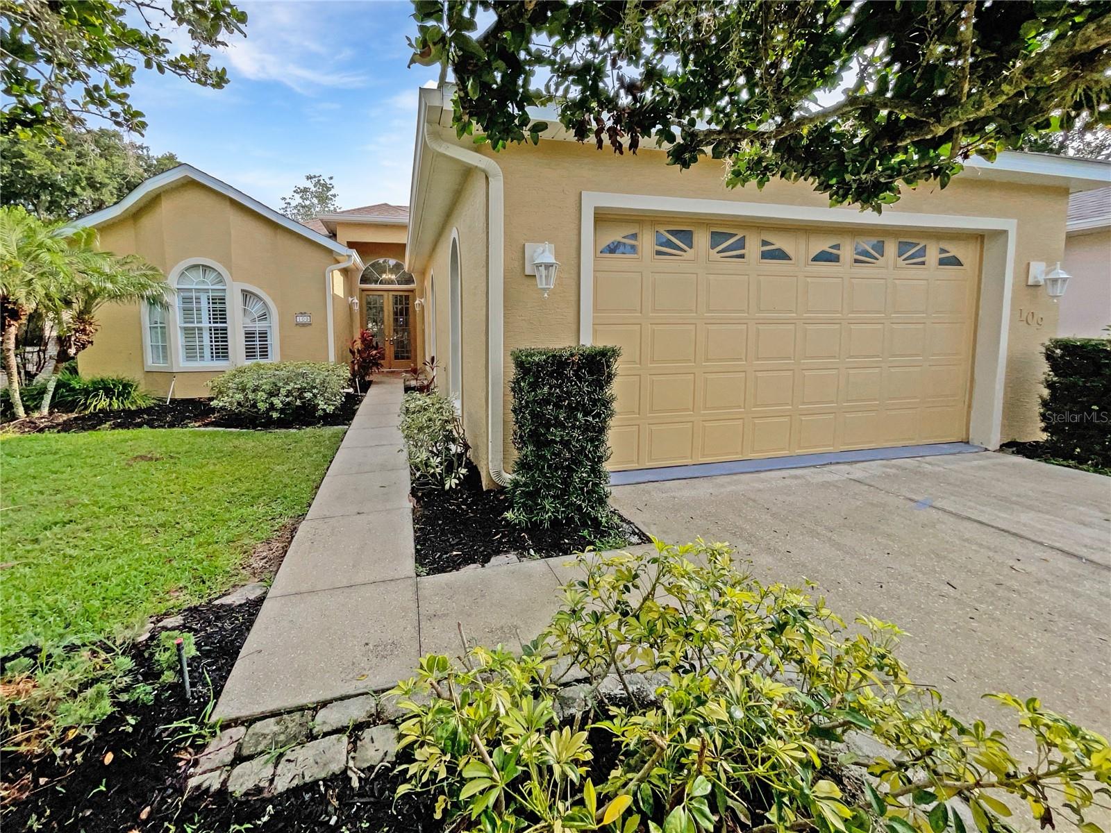 One or more photo(s) has been virtually staged. Welcome to this beautifully updated 2-bedroom, 2-bath home nestled in the vibrant lakefront community of Waterwood! Located on a private cul-de-sac, this charming residence features durable LVP and tile flooring throughout. The spacious study, highlighted by a bright bay window with a built-in bench, makes an ideal home office or reading nook. The open-concept kitchen is a chefs delight, featuring granite countertops, stainless steel appliances, and a generous breakfast bar perfect for casual dining or entertaining. The primary suite offers a large walk-in closet and a private en-suite bathroom with a relaxing spa tub and a separate walk-in shower. A versatile storage room provides plenty of space for pet supplies, boating gear, or hobbies. Enjoy community amenities that include a boat ramp, dock, fishing pier, pool, and clubhouse all on the shores of beautiful Lake Harris. Cruise by boat to historic Mount Dora or explore nearby waterfront dining options!