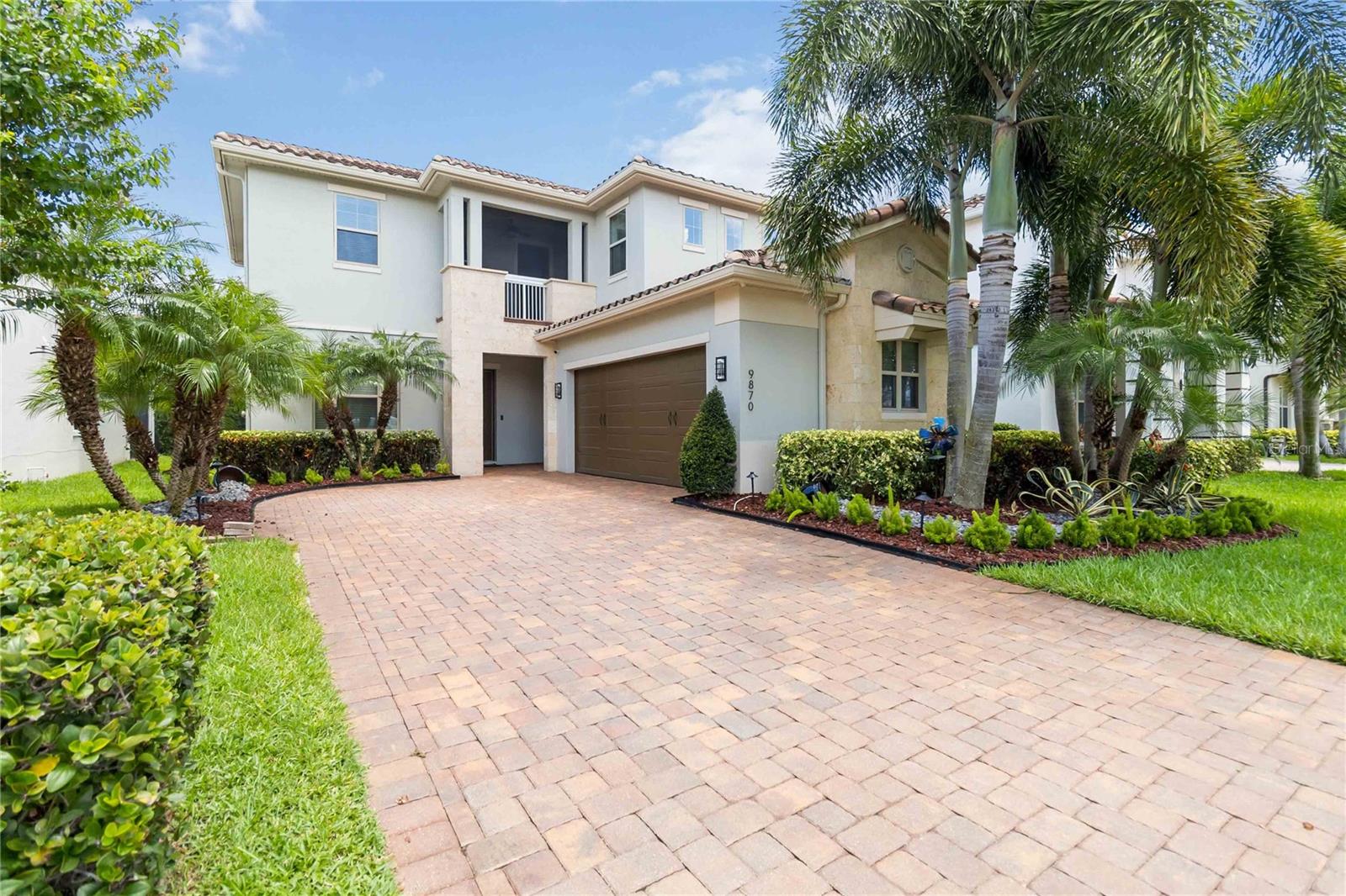 Step into refined elegance at this beautifully upgraded 4-bedroom, 3.5-bathroom residence nestled in the guard-gated community of Eagle Creek. Ideally located in the heart of Lake Nona, this exceptional home masterfully blends contemporary design with luxurious finishes, offering an elevated lifestyle designed for both relaxed living and upscale entertaining. The open-concept layout is enhanced by incredible illumination throughout the home, with customizable lighting that highlights architectural details and creates the perfect ambiance in every space. At the heart of the home, a showstopping chef’s kitchen features two expansive islands with individual lighting control, top-of-the-line Gaggenau appliances including a built-in oven and microwave, a sleek Zephyr range hood, and a built-in ice machine, making it the ideal space for culinary creativity and entertaining. The adjacent living area boasts a true statement piece — a luxurious enclosed wine cellar, beautifully integrated into the space to both display and preserve your finest collection. Step outside to your personal oasis: a fully equipped outdoor summer kitchen with a built-in grill, and a heated saltwater pool surrounded by lush landscaping — the ultimate setting for private relaxation or unforgettable gatherings. Every inch of this home reflects thoughtful luxury, from its premium upgrades to its smart functionality. Located just minutes from Medical City, Orlando International Airport, and world-class dining and shopping, the home also offers effortless access to SR-417, SR-528, and Narcoossee Rd, placing all of Central Florida within easy reach. Video tour and a 3D tour available!!!