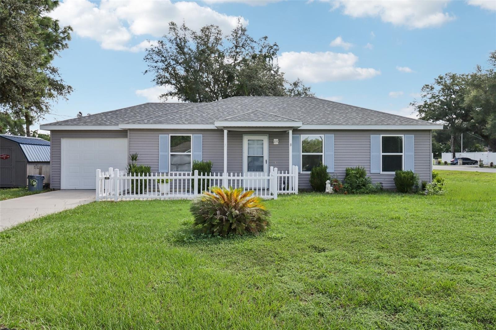 This beautiful newer home is perfect for those seeking modern comfort and style. The well-kept interior features an open floorplan that seamlessly connects the living, dining, and kitchen areas, making it ideal for entertaining or spending quality time with family. The split bedroom layout offers privacy and convenience, with spacious bedrooms that provide a tranquil retreat at the end of the day.
Enhancing the home's ambiance, the cathedral ceilings create an airy and expansive feel, while the durable vinyl flooring adds both charm and practicality. The appliances are in great condition, ensuring that you can move in without the hassle of immediate upgrades or repairs. The inside laundry area adds an extra layer of convenience to your daily routine.
The oversized lot provides ample outdoor space for activities, gardening, or simply enjoying the fresh air. The fenced-in backyard is perfect for pets or children to play safely, and the fairly new above ground spa invites you to unwind and relax after a long day. With a roof and AC system both installed in 2019, you can have peace of mind knowing that major components of the home have been recently updated.
This home not only offers a comfortable living space but also a location that’s perfect for enjoying all that the community has to offer. Don't miss out on the opportunity to make this lovely property your own!