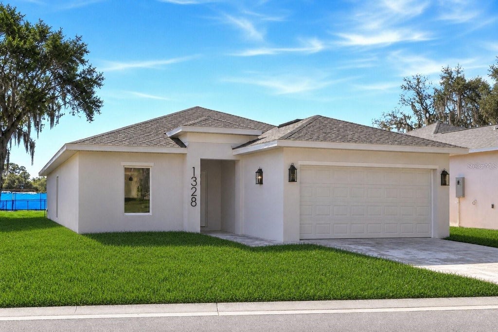Photo of 1328 Marshall Drive, Leesburg, FL 34748 (MLS # O6441332)