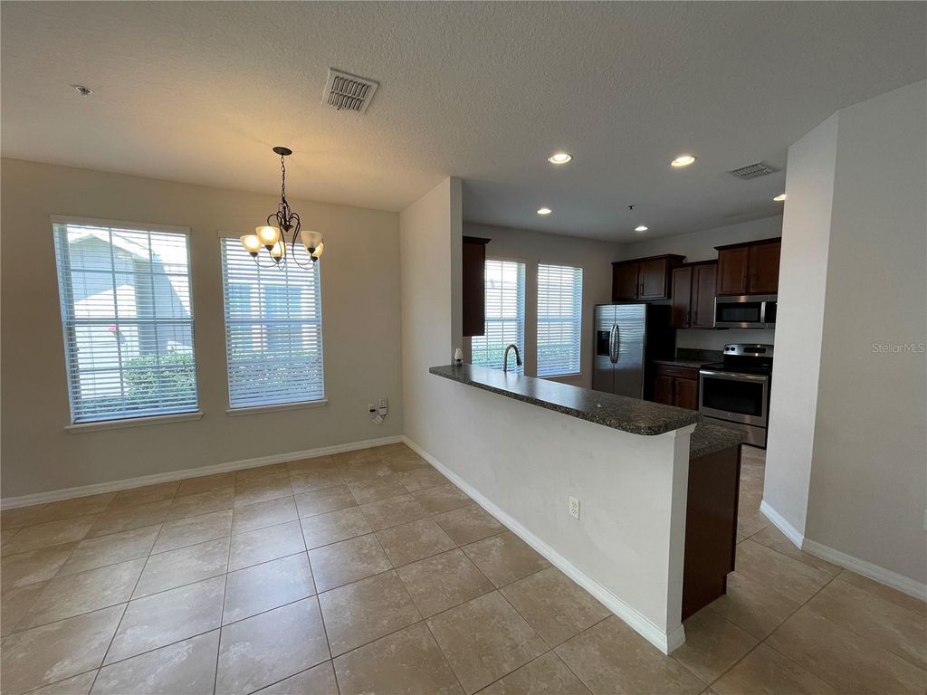 Photo of 10255 Lake District Lane #45B, Orlando, FL 32832 (MLS # O6391021)