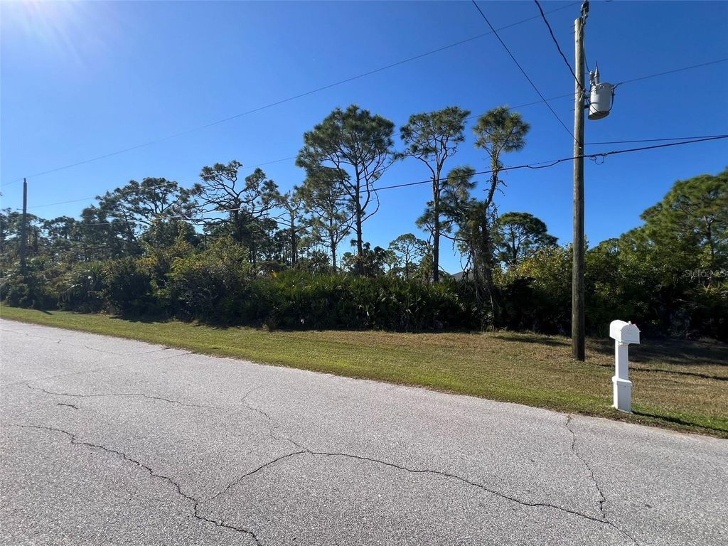 Photo of 124 Hardee Way, Rotonda West, FL 33947 (MLS # N6141536)