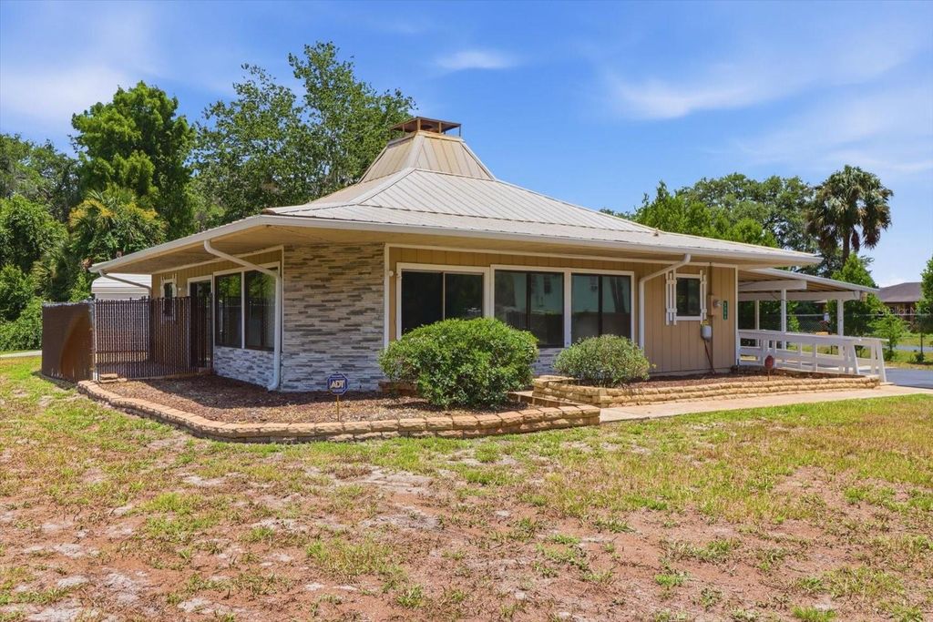 Photo of 5383 N Carl G Rose Highway, Hernando, FL 34442 (MLS # OM727905)