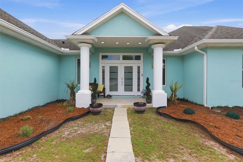 Photo of 1026 W Beresford Road, Deland, FL 32720 (MLS # V4947961)
