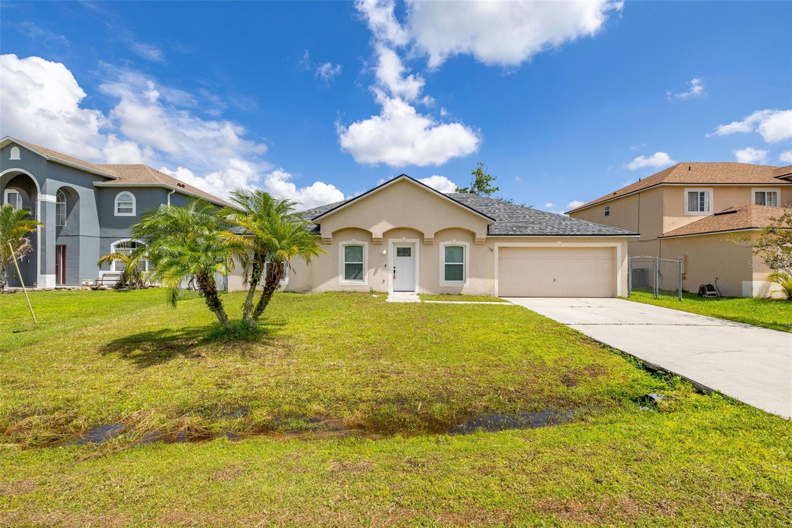 Great Value in Poinciana! This cozy home is featuring NEW ROOF (2025), replaced DOUBLE-PANED WINDOWS throughout (2020), NEW FRONT ENTRY DOOR with glass insert, TILE FLOORS in all living areas and all bedrooms for easy maintenance - NO CARPET! Sought after single story layout is featuring OPEN SPLIT FLOOR PLAN with VAULTED CEILINGS and SEPARATE FORMAL DINING & LIVING ROOMS. Functional KITCHEN features ample COUNTER-TOP SPACE and PLENTY OF CABINETS & a closet PANTRY for additional storage; convenient BREAKFAST BAR for pleasant dining experience. The kitchen opens up into a spacious FAMILY ROOM and a cozy BREAKFAST NOOK overlooking the backyard. DELUXE OWNER SUITE with walk-in closet and a private EN-SUITE BATHROOM featuring STAND UP SHOWER. Private guest bedrooms setting featuring 3 rooms and a new vanity (2025) in the guest bathroom. INSIDE LAUNDRY ROOM with GE washer and dryer included. 2-CAR GARAGE with EXTENDED DRIVEWAY and FENCED BACKYARD are perfect for family entertainment and additional storage. Internet and Cable TV is included in the HOA assessments. This is a lovely home for first-time home buyers, growing families, or investors. We welcome you to schedule a private showing and check it out!