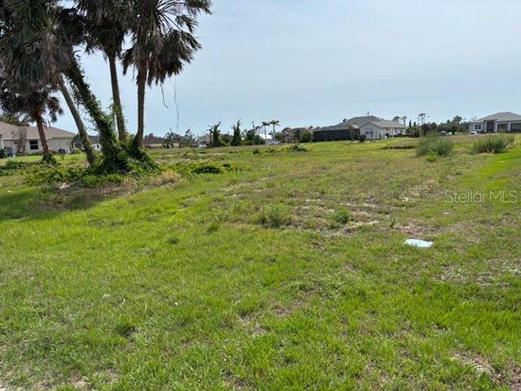 Photo of 227 Tournament Rd Cir, Rotonda West, FL 33947 (MLS # D6142246)
