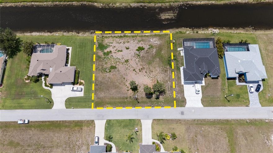 READY TO BUILD YOUR DREAM HOME IN PARADISE???   Hard to find DOUBLE LOT 160' X 120' ON A CANAL "At This Price" in the deed restricted community of Rotonda West.   Almost half an acre property located in Pine Valley. Front of house would face east, and your pool would have sun ALL afternoon & evening. Golf on one of the many golf courses, play tennis, pickleball, or take a walk on the walking trails. Close to shopping, restaurants and a short drive to area beaches! Very few vacant double lots available.