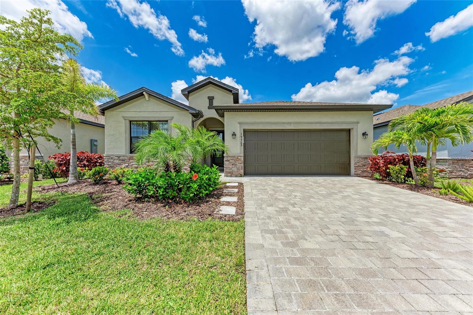 Available September 2025. Located in the highly desirable Tortuga neighborhood of Wellen Park, this stunning 2022 Marsala floor plan offers 3 spacious bedrooms, 3 full bathrooms, and a versatile den thoughtfully designed for modern living, comfort, and entertaining. The home is filled with high-end upgrades and showcases breathtaking water views throughout. At the heart of the home is the chef’s kitchen, featuring a granite island, stainless steel appliances, and ample cabinetry, all flowing seamlessly into the open-concept living and dining areas. Expansive windows bring in natural light and picturesque views of the water, creating a serene backdrop for everyday life. The primary suite is a private retreat with tranquil water views, a spa-inspired bathroom complete with a soaking tub, walk-in shower, and dual vanities, as well as dual walk-in closets that provide generous storage. The split floor plan offers privacy for guests, and both secondary bedrooms feature spacious closets, ensuring everyone has plenty of room. An oversized indoor laundry room with an added utility sink adds convenience and function. Just minutes from Downtown Wellen and CoolToday Park, this home offers the ultimate in location and lifestyle. HOA fees cover internet, cable, and lawn care, making for easy, low-maintenance living. Don’t miss your chance to own a slice of paradise in Wellen Park—schedule your private showing today!