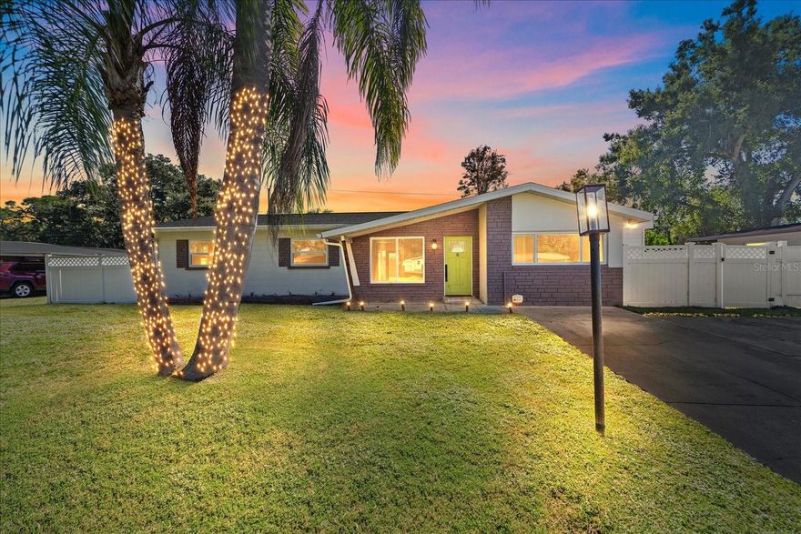 Welcome home to this Sarasota gem, where thoughtful updates and creative touches make every space feel special. As you arrive, you’ll notice the oversized driveway. Step inside to find an inviting, open layout accented with tile flooring, HURRICANE WINDOWS, and five and quarter inch baseboards that carry throughout the entire home. The living room welcomes you into the home and is stylishly designed with a brick accent wall, dry bar and wine fridge, and a clever retrofit for hiding TV cables. It is a perfect blend of vintage character and modern convenience. There are so many incredible things about this home, with the boho chic kitchen being one. With its encaustic tile floors, solid wood cabinets, stainless steel appliances, white farmhouse sink and pantry, every detail feels intentional and full of charm. The SPLIT FLOOR PLAN provides privacy between the bedrooms, making it ideal for families or guests. French doors lead you out to your backyard, where a remote control sunshade lets you adjust sun exposure with ease. This backyard is FULLY FENCED with a PEBBLE TEC LAP POOL, the perfect spot for cooling off or unwinding at the end of the day. This home offers a host of STORAGE SPACES. In the backyard, you will also find a LARGE WORKSHOP/CRAFT ROOM/SHE-SHED/GAME ROOM (whatever you desire) with an AC wall unit, new paint, and new vinyl flooring. It is perfect for your dream hobby, your next project, or as an additional space to hang out! There is also a separate SHED for your outdoor tools and toys, and attached to the home are THREE STORAGE CLOSETS. No need to stress about updating big ticket items, as the ROOF IS 2020, the AC IS 2021, and WATER HEATER IS 2022. Stylish, functional, and full of character, this property offers the best of Sarasota living, inside and out.