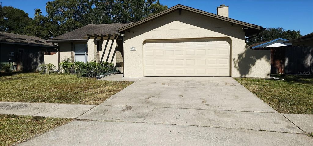 Photo of 4703 Cypress Tree Drive, Tampa, FL 33624 (MLS # TB8457419)