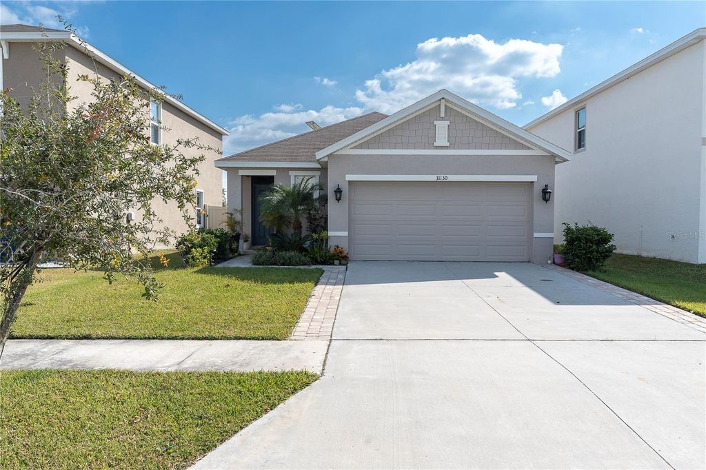 Photo of 31130 Penny Surf Loop, Wesley Chapel, FL 33545 (MLS # TB8450123)