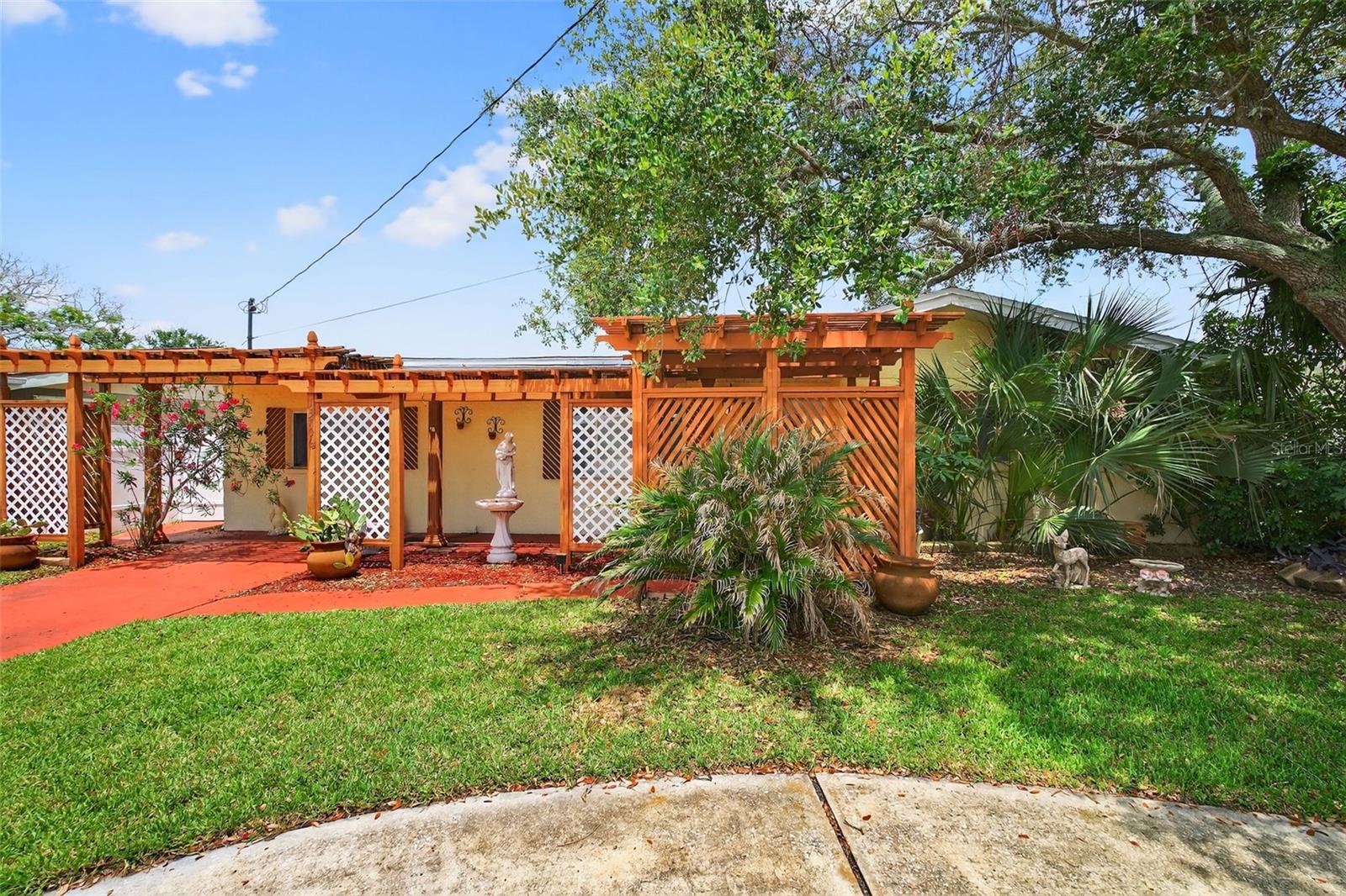 Welcome to 13706 Britton Drive – Your Waterfront Dream Awaits!
This fully restored block home is the ultimate Florida retreat, perfectly blending classic charm with modern updates—all set on a tranquil canal with direct water access. From the moment you arrive, the circular driveway, lush tropical landscaping, and inviting curb appeal welcome you to something truly special.
Step inside to discover a fully furnished interior with thoughtfully selected décor, built-in shelving, and stylish laminate flooring (with the original terrazzo preserved underneath). The updated kitchen features granite countertops, stainless steel appliances, and overlooks your private backyard oasis—complete with a sparkling in-ground pool and serene water views.
Love to entertain? You’ll be right at home with the screened-in pool enclosure, covered patio, outdoor paver area, and even a poolside kitchenette—perfect for hosting friends and family year-round. The pool was resurfaced just 2 years ago, and the roof was replaced in 2024, giving you peace of mind for years to come.
This waterfront gem features a new floating dock (2025) and a sea wall replaced just 8 years ago, making it an ideal spot for boating, kayaking, or simply soaking in the view. Inside, the large master suite offers a private retreat, while two additional bedrooms provide flexible space for guests or a home office. The washer and dryer are included, and a tankless water heater adds to the home’s efficiency.
Best of all—no HOA, no CDD! Whether you're looking for a full-time residence, seasonal escape, or a turn-key short-term rental investment, this home checks every box. Fully restored after storm damage with all drywall professionally removed and dried within 24 hours, this home has been brought back better than ever.
Don’t miss your chance to own this move-in-ready, fully furnished waterfront oasis!