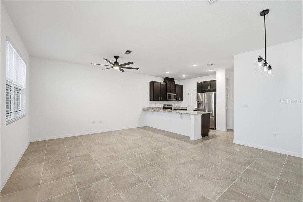 Photo of 11554 Buoy Point Place, Orlando, FL 32832 (MLS # O6369799)