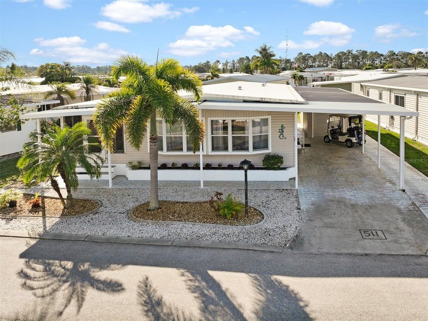 Welcome to your slice of paradise in Six Lakes Country Club, a desirable 55+ manufactured home community. This turnkey furnished two-bedroom, two-bath home is ready for you to move right in and even comes with its own golf cart so you can start enjoying the Florida lifestyle from day one.

Inside, you’ll find a bright and sunny living room filled with natural light and a warm, welcoming atmosphere. The inviting Florida lanai room is perfect for morning coffee or relaxing with friends after a day on the golf course. The kitchen and dining areas flow nicely together, creating a comfortable space for everyday living or entertaining guests.

Outside, there is a golf cart garage with a laundry area, a covered carport, and low-maintenance landscaping. The Six Lakes community offers resort-style living with an active social calendar and outstanding amenities, including an 18-hole executive golf course and pro shop, tennis and pickleball courts, a heated pool and spa, on-site restaurant and bar, and an active clubhouse hosting a wide variety of social events and activities.

Whether you are looking for a winter retreat or a full-time Florida residence, this charming home offers comfort, convenience, and a welcoming community atmosphere. Don’t miss the opportunity to live the good life in Six Lakes, where every day feels like vacation.