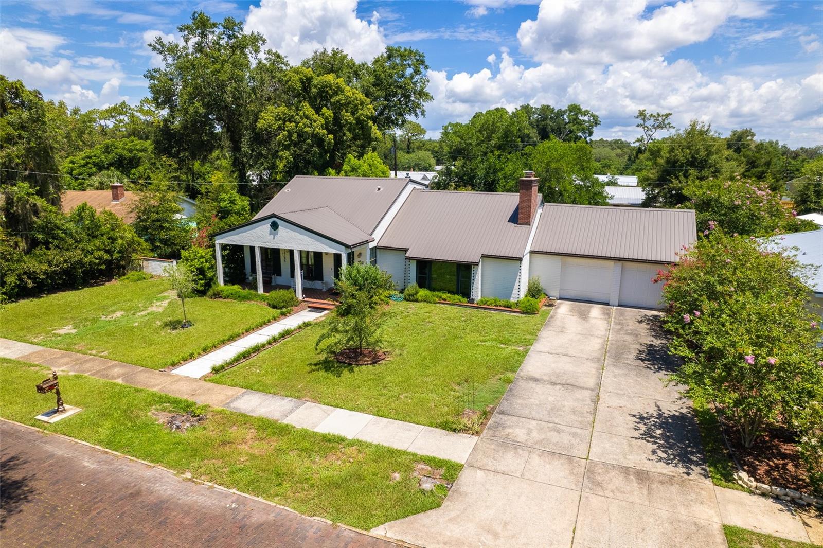 Step into timeless charm with this beautifully maintained 3-bedroom, 2.5-bath home built in 1910. Nestled on a generous 0.42-acre lot in a quiet well-established neighborhood, this property offers classic character with modern comforts. You'll love the spacious layout, original architectural details, and thoughtful updates throughout. Enjoy the freedom of no HOA. giving you flexibility to truly make this home your own. Located in a highly desirable area known for its peaceful setting and community feel, this home offers both charm and convenience. Don't miss your chance to own a piece of history in a great neighborhood!