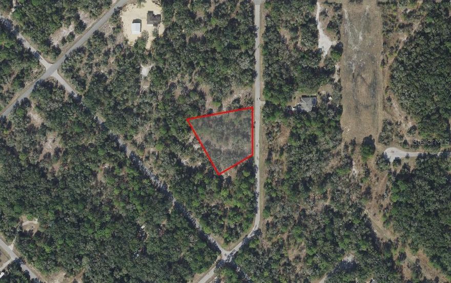 Discover the potential of this spacious 1.16-acre corner lot located within a quiet, established residential community in the heart of Crystal River. Offering a rare combination of privacy, open space, and flexibility, the generous size and desirable corner location provide multiple options for home placement, driveway access, and outdoor living design while creating a more open and secluded setting from neighboring properties. Surrounded by natural vegetation and peaceful residential surroundings, this property is the perfect canvas for a custom-built home with room for gardens, a workshop, recreational areas, or future additions. Enjoy the comfort of paved road access and a neighborhood designed for residential living, blending rural charm with everyday convenience. Just minutes away, Crystal River’s renowned natural attractions await, including crystal-clear springs, boating and kayaking waterways, fishing destinations, parks, and nature preserves ideal for hiking and outdoor recreation. Shopping, dining, schools, and daily conveniences are also within easy reach, making this an exceptional opportunity to enjoy privacy, nature, and the freedom to create your dream property without sacrificing accessibility.