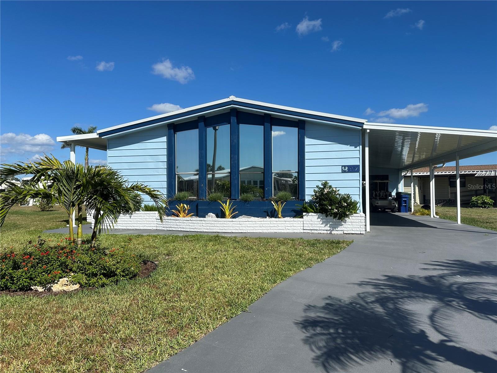 TURNKEY FURNISHED IN THE MOST DESIRABLE 55+ COMMUNITY IN THE NORTH PORT/VENICE AREA! Updated and gorgeous, this 2/2 is available for lease NOW. Are you a traveling nurse, or waiting for a home to be built, or just want to check out the area before committing to buy...you're in luck! Can lease up to one year, or less. Maybe you only need a 6 month lease, or 8 months, it's ok, owner is flexible. One year is desired though! If lease is for season, 4 months is minimum, and the rental price is $2500 monthly. This 55+ community is VERY active with great amenities including fitness room, large pool, spa, pickleball, shuffleboard, and lots of get togethers and classes to choose from! There is a small marina in the back off the Myakka River where you could store a kayak or pull up a boat. There are restrictions on leaving a boat there however.
This beautiful double wide has 1456 sq ft, and has a long carport that could accommodate 2 vehicles. Inside laundry room. TURNKEY FURNISHED with a king bed in the primary bedroom and a queen bed in the 2nd bedroom. Bathrooms have stand up showers, no tubs. This property is NOT handicapped accessible, but does have grab bars in the showers. Rent includes lawn care, pest control, cable and internet, HOA fees, water and sewer (capped at $125 monthly). Don't wait!
