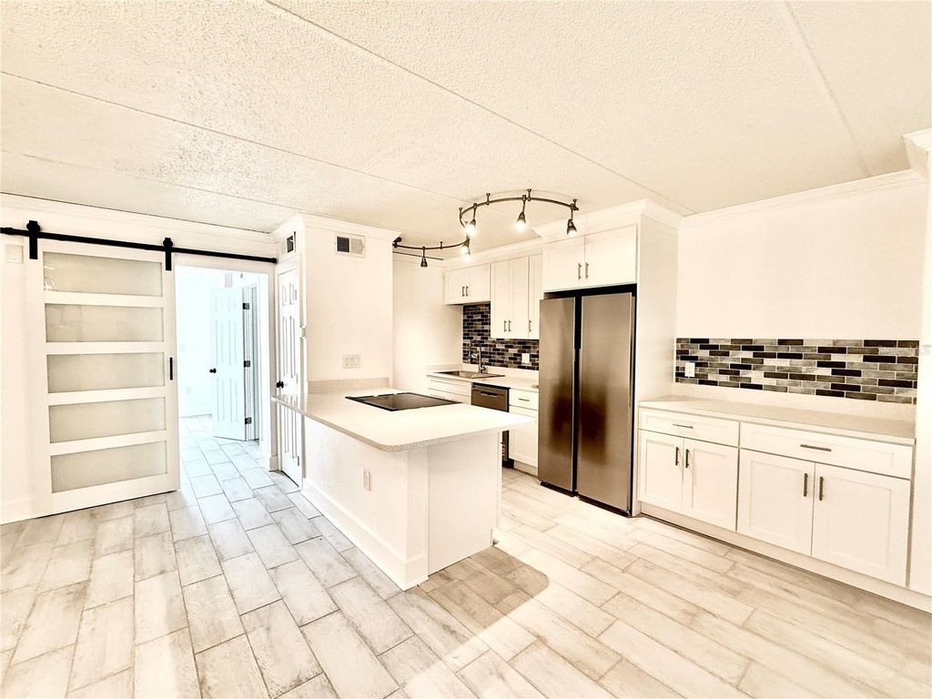 Photo of 8901 Blind Pass Road #128, St Pete Beach, FL 33706 (MLS # TB8460201)