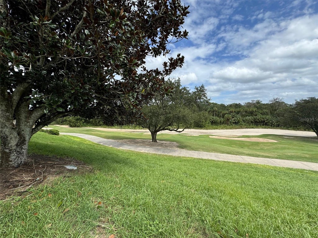 Photo of 7632 Excitement Drive, Reunion, FL 34747 (MLS # O6432055)