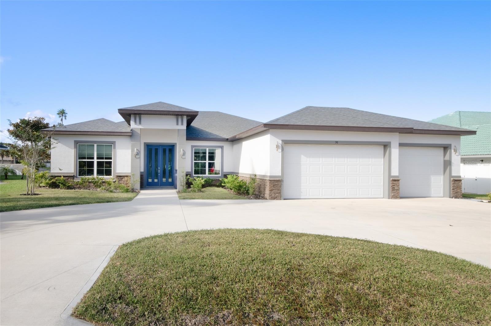 The ultimate saltwater lifestyle awaits in this like-new 2021 waterfront pool home with all the bells and whistles! Why wait to build when you can move right into this upgraded residence on the main canal complete with a heated saltwater pool and brand-new 2024 pool heater, plus a private boat lift just 2,000 feet from the Intracoastal Waterway.
Step inside to discover a bright, modern open floor plan perfect for entertaining. The gourmet kitchen is the heart of the home with sleek cabinetry, dramatic quartz waterfall-edge countertops, high-end appliances, and an abundance of storage. The primary suite offers gorgeous water views and a spa-inspired bathroom retreat, while two of the additional bedrooms are connected by a Jack-and-Jill bath that also functions as a second suite.
Indoor and outdoor living blend seamlessly as oversized sliding glass doors open to the expansive 14’ x 38’ covered patio complete with wet bar. From there, take in the oversized screened lanai, the sparkling heated pool, and the sights of dolphins and boats gliding by. The private dock and boat lift make it easy to set out for a sunset cruise or catch dinner right from your backyard.
Built in 2021 with modern design and upgraded finishes, this home is both stylish and functional. It has also been used as a successful short-term rental, with furniture negotiable for those seeking a turn-key investment. The location is second to none—just minutes to golf, parks, shopping, and restaurants, ten minutes to Flagler Beach, and within walking distance to European Village with its Sunday farmers market, live music, and dining options.
This is truly a rare opportunity to secure a waterfront pool home with quartz countertops, luxury upgrades, and every feature already in place, offering the very best of Florida living.