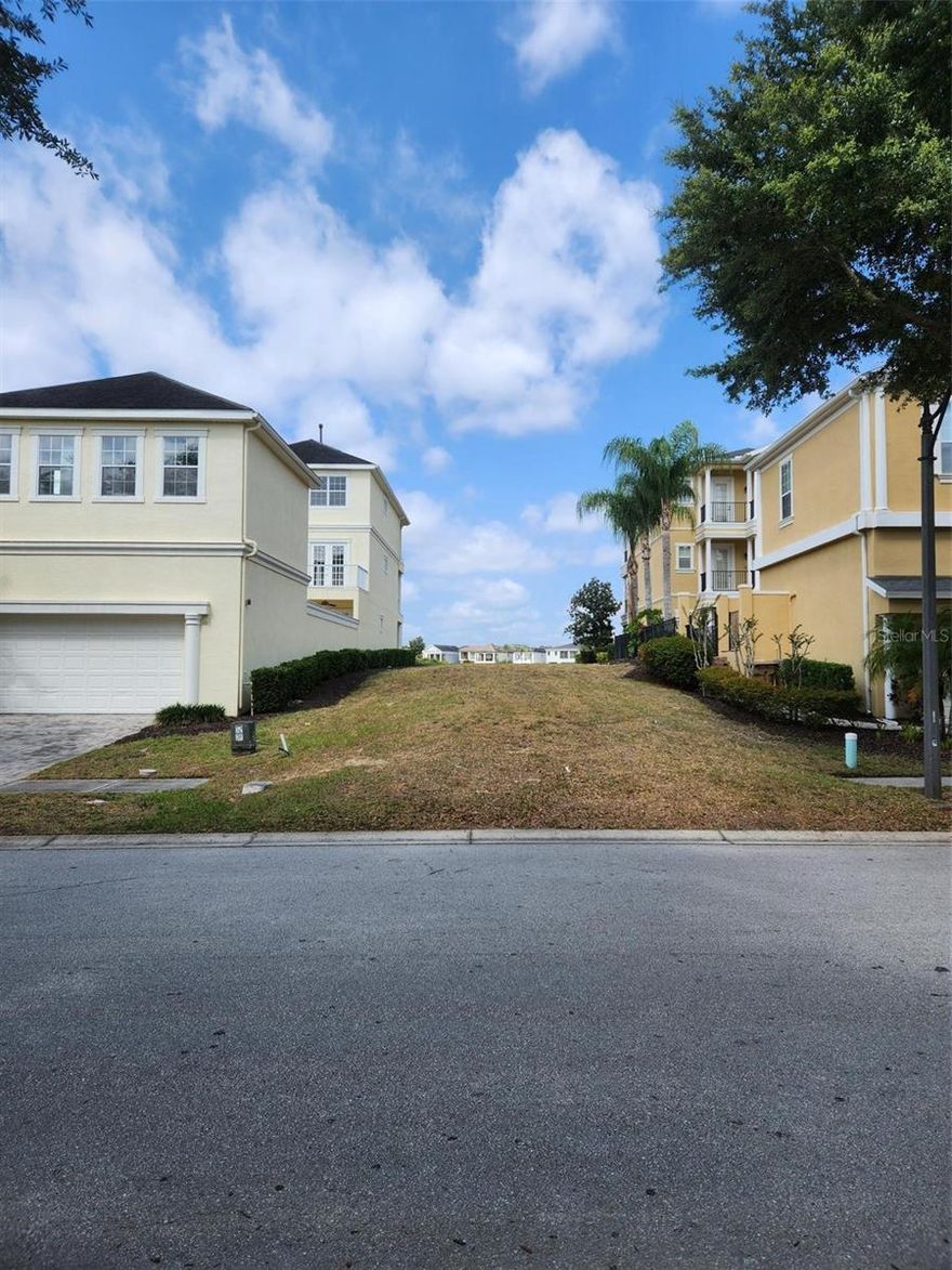 BIG PRICE REDUCTION!  Golf Frontage Lot in Reunion Resort!! This Lot is located in the East Side of Reunion Resort in the Liberty Bluff neighborhood. You don't want to miss the view from this lot is awesome! This Lot offers both open golf and park views. You will be able to enjoy the view of the signature sixth hole of the Arnold Palmer golf course and also open views of the parks. The upper balconies of your new home could also offer far-reaching views over to the seventh tee with its lake and the Reunion Grande in the background.  You will need to utilize one of the amazing Reunion featured builders to design your next vacation home or permanent residence. This Lot has**Active Membership to the Reunion Club** and is transferrable to the new buyer at the buyer's cost. Giving you access to all of the on-site amenities on resort. A short walk, drive, bicycle or golf cart ride away are the fantastic amenities including three championship golf courses, tennis and pickleball complex, on-site water park, 10 on-site swimming pools, mini-golf, on-site resort shuttle service and multiple restaurants and lounges.  Reunion Resort is a 2,300-acre resort and golf community, just 6 miles from Walt Disney World and the parks.