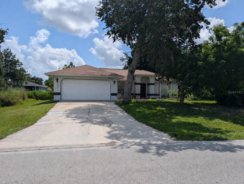 Photo of 1298 Viscaya Drive, Port Charlotte, FL 33952 (MLS # C7529910)