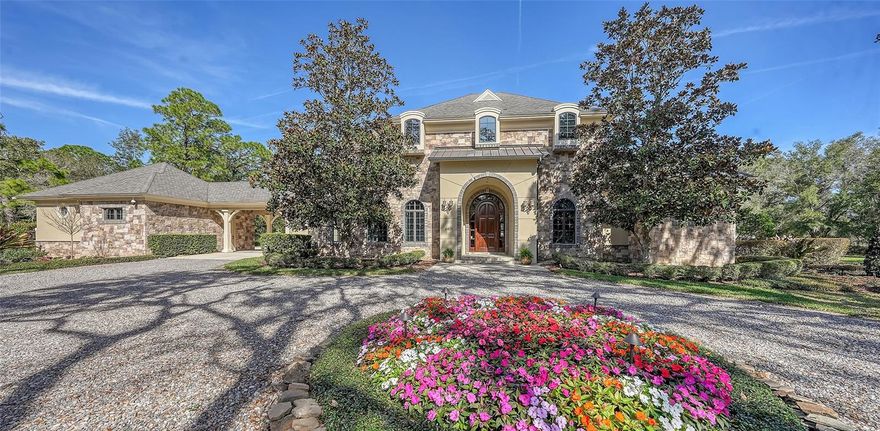 Similarly fashioned to a European Country Estate, this decadent 7,750 square foot residence is a verdant oasis set on 5
acres surrounded by live oaks and beautiful gardens to create one of the most exquisite showplaces in Sarasota.