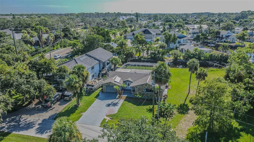 Photo of 5254 Miller Bayou Drive, Port Richey, FL 34668 (MLS # TB8530139)