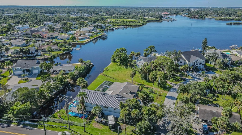 Photo of 5254 Miller Bayou Drive, Port Richey, FL 34668 (MLS # TB8530139)